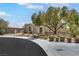 Inviting single-story home with mature trees, and lush landscaping at 10277 Roma Madre Ave, Las Vegas, NV 89135