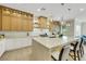Stylish kitchen showcasing a large island, custom cabinetry, and modern finishes at 10277 Roma Madre Ave, Las Vegas, NV 89135