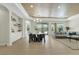 Expansive living room with hardwood floors and recessed lighting showcasing modern decor, open layout, and a bright, inviting space at 10277 Roma Madre Ave, Las Vegas, NV 89135