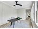 Stylish office space with bright windows, modern decor, and a contemporary ceiling fan at 10277 Roma Madre Ave, Las Vegas, NV 89135