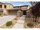 Charming two-story home boasts a well-kept front yard, gated entry, desert landscaping and a two car garage at 10440 Bay Ginger Ln, Las Vegas, NV 89135