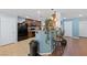 Kitchen area with a breakfast bar and modern appliances, perfect for entertaining at 10440 Bay Ginger Ln, Las Vegas, NV 89135