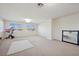 Bright bonus room with natural light, neutral carpet, and space for activities at 10948 Carberry Hill St, Las Vegas, NV 89141