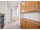 Upstairs hallway with built-in storage and carpeted floor at 10948 Carberry Hill St, Las Vegas, NV 89141
