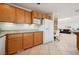 Kitchen with oak cabinets, granite countertops and stainless steel appliances at 10948 Carberry Hill St, Las Vegas, NV 89141