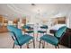 Open floor plan with breakfast nook, modern lighting, and cozy seating arrangement at 10948 Carberry Hill St, Las Vegas, NV 89141
