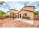 Backyard featuring brick pavers, a pergola, outdoor storage, and lovely landscaping at 11177 Deluna St, Las Vegas, NV 89141