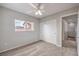 Bedroom with ceiling fan, carpeted floor and closet at 11177 Deluna St, Las Vegas, NV 89141