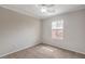 Bedroom with neutral tones, carpet and a view from the window at 11177 Deluna St, Las Vegas, NV 89141
