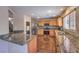 Well-equipped kitchen featuring modern stainless steel appliances, granite countertops, and ample cabinet space at 11177 Deluna St, Las Vegas, NV 89141