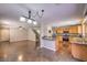 Bright living room with stairs near kitchen at 11177 Deluna St, Las Vegas, NV 89141