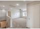 View of the upstairs loft with carpeted floor and ceiling fan at 11177 Deluna St, Las Vegas, NV 89141