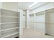 Large walk-in closet with custom shelving and ample storage space at 11177 Twilight Times Ct, Las Vegas, NV 89135