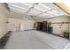 Spacious three-car garage with ample storage and utility connections at 11177 Twilight Times Ct, Las Vegas, NV 89135