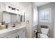 Stylish bathroom featuring a modern vanity, contemporary fixtures, and a shower/tub combo at 11340 Espadrille Ct, Las Vegas, NV 89138