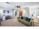Spacious bonus room with neutral paint, carpet, a ceiling fan and an attached bath at 11340 Espadrille Ct, Las Vegas, NV 89138