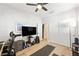 Versatile home office and gym space with hardwood floors, modern appliances, and closet storage at 11340 Espadrille Ct, Las Vegas, NV 89138