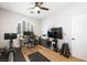 Bright and airy office featuring contemporary design, exercise equipment and plenty of workspace at 11340 Espadrille Ct, Las Vegas, NV 89138