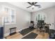 Functional home office space with natural light, modern appliances, and room for exercise equipment at 11340 Espadrille Ct, Las Vegas, NV 89138