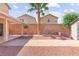 The backyard has a shed, palm tree, gravel ground, and a brick wall at 11755 Garland Grove Ln, Las Vegas, NV 89183
