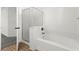 Bright bathroom featuring a shower with glass door and separate soaking tub at 11755 Garland Grove Ln, Las Vegas, NV 89183