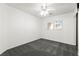 Bedroom with neutral color, carpet floors, ceiling fan and a view from the window at 11755 Garland Grove Ln, Las Vegas, NV 89183