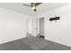 Bedroom with carpet floors, ceiling fan, and closet with mirrored sliding doors at 11755 Garland Grove Ln, Las Vegas, NV 89183