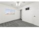 Bedroom with ceiling fan, a closet with sliding doors, carpet floors and a window with blinds at 11755 Garland Grove Ln, Las Vegas, NV 89183