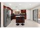 Kitchen featuring stainless steel appliances, granite countertops and barstool seating at the island at 11755 Garland Grove Ln, Las Vegas, NV 89183