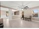 Bright living room featuring stylish tiled floors and lots of natural light at 11755 Garland Grove Ln, Las Vegas, NV 89183