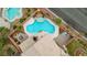 An aerial view of the backyard pool and spa with the desert landscaping enhancing the experience at 1200 Dream Bridge Dr, Las Vegas, NV 89144