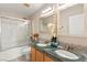 Bathroom featuring double sinks, and a bathtub at 1200 Dream Bridge Dr, Las Vegas, NV 89144