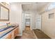 Bathroom featuring decorative tile accents on the countertops and shower bench at 1200 Dream Bridge Dr, Las Vegas, NV 89144
