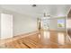 Primary bedroom with wood floors, ensuite bathroom, and natural light at 1200 Dream Bridge Dr, Las Vegas, NV 89144