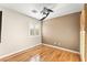 Bedroom with hardwood floors, bright windows and a sliding barn door to the closet at 1200 Dream Bridge Dr, Las Vegas, NV 89144