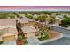 Two-story home featuring desert landscaping, a tile roof, and an attached two-car garage at 1200 Dream Bridge Dr, Las Vegas, NV 89144
