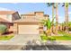 Inviting home boasting a meticulously kept yard and an attached two-car garage at 1200 Dream Bridge Dr, Las Vegas, NV 89144
