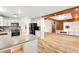 Well-designed kitchen flowing into the living space, featuring stainless steel appliances, and a convenient layout for cooking at 1200 Dream Bridge Dr, Las Vegas, NV 89144