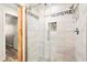 Walk-in shower features custom tile work, glass door, and modern fixtures at 1200 Dream Bridge Dr, Las Vegas, NV 89144