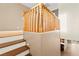Wooden staircase with railing leading to the upper floor with carpeted steps at 1200 Dream Bridge Dr, Las Vegas, NV 89144