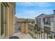 Balcony view of community landscaping and townhome exterior at 1200 Paradise Basin Ct, Henderson, NV 89002
