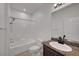 Bathroom featuring a shower-tub combo, vanity, and tile flooring at 1200 Paradise Basin Ct, Henderson, NV 89002