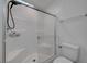 Modern bathroom features a glass door shower with white subway tile and a sleek design at 1200 Paradise Basin Ct, Henderson, NV 89002