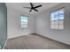 Bedroom with carpet, ceiling fan, and windows at 1200 Paradise Basin Ct, Henderson, NV 89002