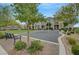 Inviting community park with benches, trees, and playground equipment surrounded by manicured landscaping at 1200 Paradise Basin Ct, Henderson, NV 89002