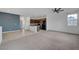 Open-concept living room flows into a modern kitchen, creating a great space for entertaining guests at 1200 Paradise Basin Ct, Henderson, NV 89002