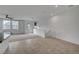 Bright and airy living room featuring modern finishes, with tile floors and carpeted area at 1200 Paradise Basin Ct, Henderson, NV 89002