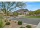A common playground area offers swings and a climbing structure, set against a backdrop of neighborhood homes at 1200 Paradise Basin Ct, Henderson, NV 89002
