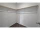 A spacious walk-in closet with ample storage and wood shelves, ready for organization at 1200 Paradise Basin Ct, Henderson, NV 89002