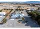 Aerial view of home with swimming pool, landscaping, and spacious lot at 1251 Cavalry St, Pahrump, NV 89048